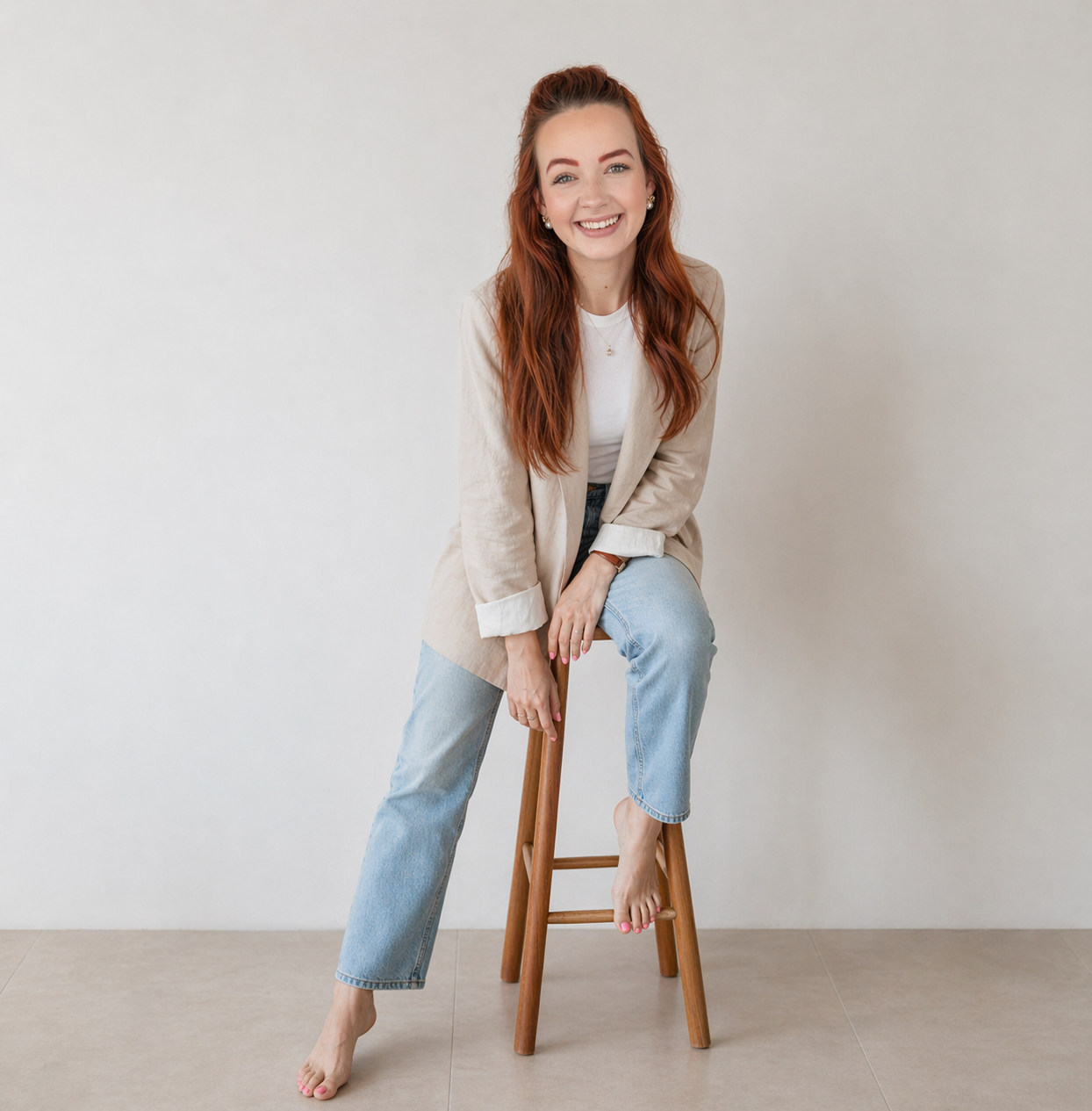 Coach portrait sitting on a wooden stool